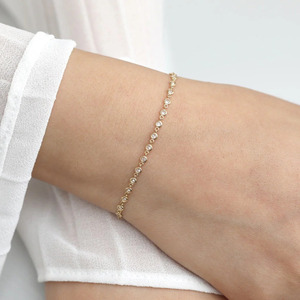 Bracelet tennis de luxe pour femme en or jaune serti de diamants de laboratoire taille brillant rond - Product Image 2
