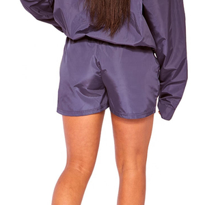 Ensemble de survêtement de luxe pour femme : veste coupe-vent à manches raglan courtes et pantalon, avec veste zippée coupe-vent et haut court - Product Image 2