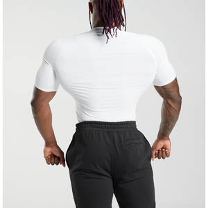 T-shirt de compression pour homme, coupe ajustée, tissu extensible, anti-transpiration, pour la gym, l'entraînement, la course à pied et les sports. - Product Image 2
