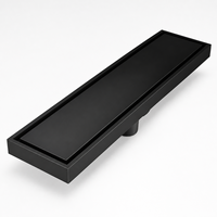 Caniveau de douche linéaire en acier inoxydable noir mat sur mesure avec insert en carrelage, canal de sol dissimulé pour salles de bain modernes et zones humides