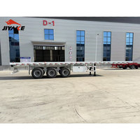 Prix d'usine Semi-remorque plateau porte-conteneurs 2/3/4 essieux 20ft 40ft, Semi-remorque plateau 50T 60T avec attaches de conteneur