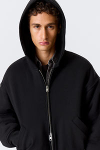 Chaqueta Acolchada con Cremallera Frontal y Capucha, Tejido Grueso, Atuendo Cómodo y Relajado, Unisex, Fabricación de Ropa OEM ODM, Venta al Por Mayor - Product Image 3