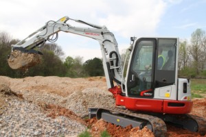 Mini-excavatrice Takeuchi TB257FR haut de gamme, design compact, performances hydrauliques puissantes pour les travaux de construction, de terrassement et de chantier. - Product Image 5