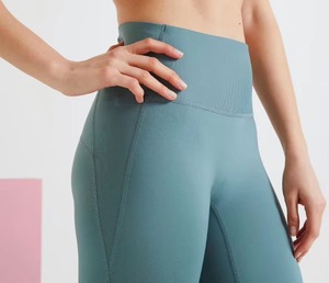 Women's Solid High Quality Breathable Spandex/<b>Nylon</b> <b>Leggings</b> | Twist Design Pockets | Elastic Waist Full-Length Gym Yoga Fitness - Product Image 2