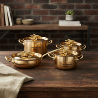 Ensemble de casseroles et faitouts en acier inoxydable, écologique, de conception européenne moderne, fabriqué artisanallement, avec poignées décorées motif raisins, de qualité alimentaire