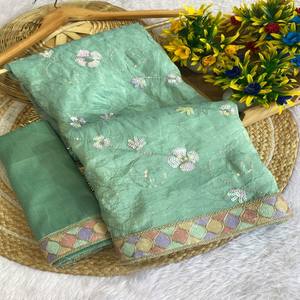 Vastra Cottage ส่าหรีผ้าไหมสีเขียวมิ้นท์สีทองปักเลื่อมลายดอกไม้และขอบหลายสี - Product Image 1