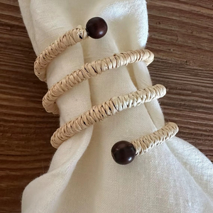 แหวนรองผ้าเช็ดปากหวายรูปทรงดอกไม้ประดับลูกปัดสีดำ งานถักมือ ตกแต่งโต๊ะอาหาร สำหรับร้านอาหาร คาเฟ่ บ้าน และงานจัดเลี้ยง - Product Image 1