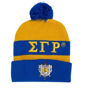 หมวกบีนนี่ SGRHO แบบกำหนดเอง ปักตราสัญลักษณ์ Sigma Gamma Rho สีน้ำเงินทอง สำหรับชมรมพี่น้องชาวกรีก พร้อมพู่ห้อย ถักไหมพรม สำหรับฤดูหนาว อุ่นสบาย มีขอบพับ - Product Image 1