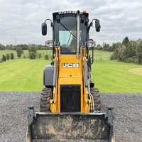 Chargeuse-pelleteuse JCB 1CX avec design compact, performances de creusement puissantes et construction fiable pour travaux lourds