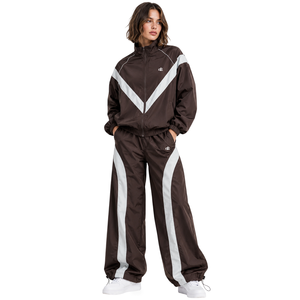 Conjunto de Chaqueta y Pantalones Cortavientos Ligeros Unisex, Personalizables con Marca, Resistentes al Agua, Ropa de Exterior OEM, Corte Holgado - Product Image 1