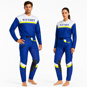 Ceci est un ensemble d'équipement de trial bleu de la collection Victory Racing, comprenant un maillot de performance et un pantalon assorti, conçu pour le motocross. - Product Image 1