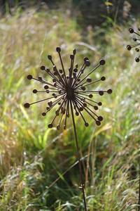 Red Metal Starburst Garden Stakes Outdoor Decor Modern Style Plastic Coated for Yard and Patio - Product Image 4