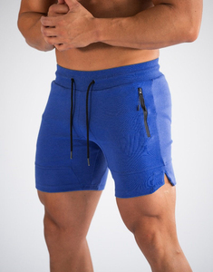 Shorts de sport décontractés pour hommes en polyester/coton bleu uni avec cordon de serrage, poche zippée, taille haute, tricotés, écologiques et à séchage rapide - Product Image 1