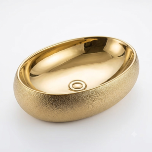 Lavabo Ovalado de Latón Martillado con Exterior Texturizado e Interior Dorado Brillante para Proyectos de Renovación de Baños de Primera Calidad - Product Image 1