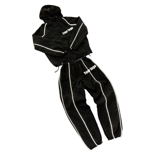 <b>Tracksuits</b> made from 100% nylon with <b>plain</b> dyed techniques designed comfortable and stylish activewear sets - Product Image 1