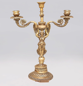 Regal classical brass 3-lite <b>candelabra</b> supported by a sculptural winged angel figurine on a tiered pedestal base. Available - Product Image 1