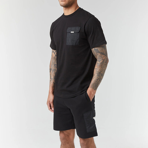 Conjunto de 2 Piezas para Hombre, Camiseta de Algodón Negra con Cuello Redondo, Estilo Casual de Verano, Tejido Transpirable, Color Sólido, Pantalones Cortos y Camiseta - Product Image 1