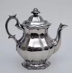 กาน้ำชาสแตนเลสหรูหรา สไตล์วินเทจ สวยงาม พร้อมฝาปิด ผิวเงา สำหรับเสิร์ฟชา ใช้ในบ้านและโรงแรม - Product Image 1