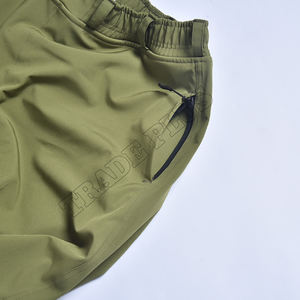 Pantalones de esquí impermeables con ribete de estrella reflectante verde oliva con forro polar cálido y múltiples bolsillos de carga - Product Image 4