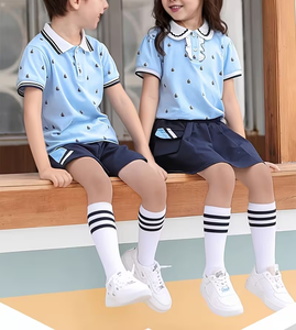 Light Blue Printed Short Sleeve Polo Shirt with Navy Trim for Kids Casual Eco-Friendly Breathable School Uniform Look - Product Image 1