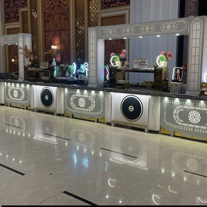 Comptoir de buffet pour mariage indien, souvent éclairé par des lumières et décoré de finitions dorées ou à motifs. - Product Image 5
