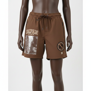 กางเกงขาสั้นวินด์เบรกเกอร์สำหรับผู้หญิง ผ้าไนลอนพรีเมียม สีน้ำตาลล้วน พร้อมปักโลโก้ด้วยไหมเชนีล และแผ่นปะลาย PVC - Product Image 5