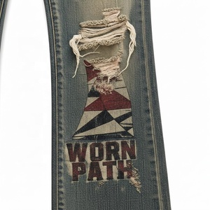 Jean en denim évasé taille haute avec patch aigle et délavage déchiré style vintage pour homme, streetwear en coton, collection automne - Product Image 4