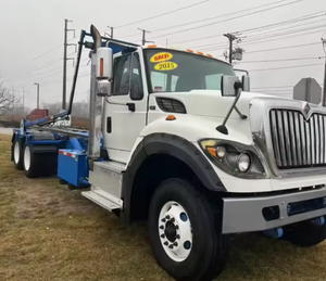 Camión de trabajo pesado International WorkStar 7600 Roll Off Truck 6*4 con transmisión manual, usado, listo para enviar, años 2015-2018, en venta. - Product Image 3