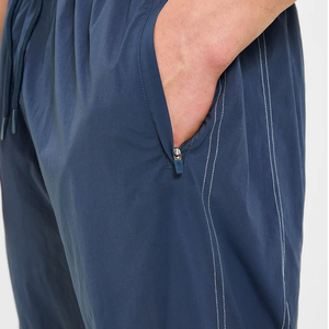Fabricación Profesional de Chaqueta Cortavientos de Nailon para Hombre, Traje Deportivo Ligero de Poliéster, Pantalones Cortavientos Casuales para Correr, Estilo Deportivo Informal - Product Image 6