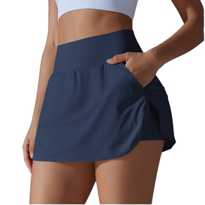 Jupe sportive asymétrique taille haute pour femme, couleur unie, avec poche, bleu marine, tissu respirant, longueur mini - Product Image 1