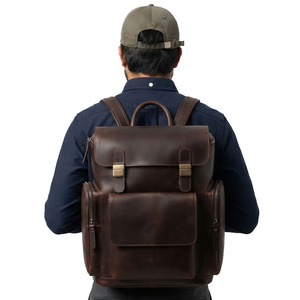 Sac à dos en cuir pour ordinateur portable, unisexe, sac à dos de voyage haut de gamme avec poches intérieures sécurisées et bretelles réglables robustes - Product Image 1
