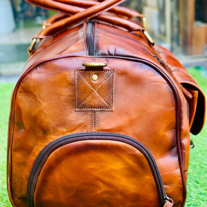 กระเป๋าเดินทางสุดสัปดาห์หนังแท้ทั้งใบ ดีไซน์ทันสมัย ความจุเยอะ ซิปเรียบลื่น สายสะพายไหล่สบาย เป็นมิตรกับสิ่งแวดล้อม ผลิตในอินเดีย - Product Image 1