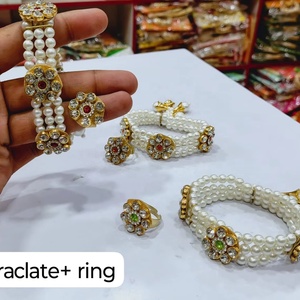 Elegant Pearl Floral <b>Bracelet</b> and Ring <b>Set</b> for Women Ethnic Jewelry Gold Plated Handcrafted Design Wedding Festive Wear - Product Image 1