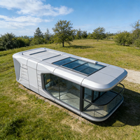 Maison capsule spatiale Apple préfabriquée moderne, cabine modulaire isolée et mobile pour les voyages en plein air et l'hébergement résidentiel
