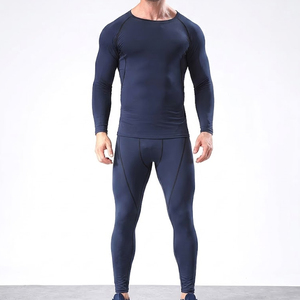 Conjunto de camiseta y pantalones de compresión para gimnasio para hombre, de secado rápido, manga larga. - Product Image 1