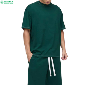 T-shirt en coton uni à col rond et manches courtes pour homme Behram International, coupe ample décontractée, bordure contrastée en jersey tricoté - Product Image 1