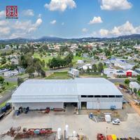 Structure en acier préfabriquée pour entrepôt, résistante aux tremblements de terre, personnalisable et conçue pour les bâtiments industriels