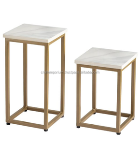 Tabourets d'intérieur intemporels fabriqués avec un moulage en métal coulé à la main et des dessus en marbre magnifiquement polis pour une élégance durable - Product Image 1