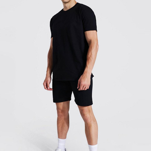 Ensemble t-shirt et short en coton noir pour homme, tenue décontractée d'été, respirante, tricotée, couleur unie - Product Image 1