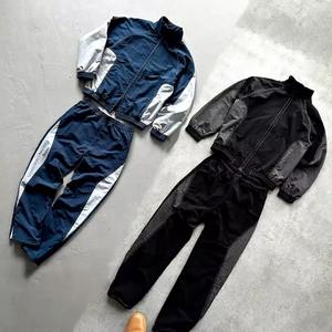 Conjunto deportivo de dos piezas con logotipo personalizado, chaqueta cortavientos de nailon, ropa deportiva urbana para hombre, con cremalleras, cortavientos, talla grande. - Product Image 1