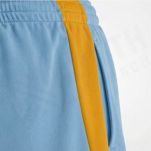 กางเกงฟุตบอลชายหญิง ดีไซน์ใหม่ พิมพ์ชื่อและหมายเลขได้ น้ำหนักเบา แห้งเร็ว ระบายอากาศได้ดี ผลิตจากโพลีเอสเตอร์ 100% - Product Image 5