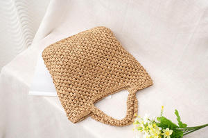 Upgrade your daily accessory collection with this premium Natural yarn bag designed with a classic square body and <b>top</b> grips - Product Image 3