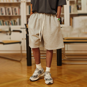 กางเกงขาสั้นขายส่งสำหรับฤดูร้อน ทรงโอเวอร์ไซส์ สกรีนโลโก้ตามสั่ง ผ้าวอร์สเตดผสมสแปนเด็กซ์/ผ้าฝ้ายออร์แกนิค มีเชือกผูกเอว ระบายอากาศได้ดี สีพื้น - Product Image 1