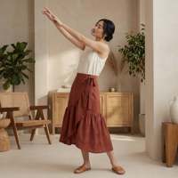Jupe mi-longue en coton rouge brique à volants pour femmes, avec tissu léger, style moderne, coupe confortable pour tous les jours