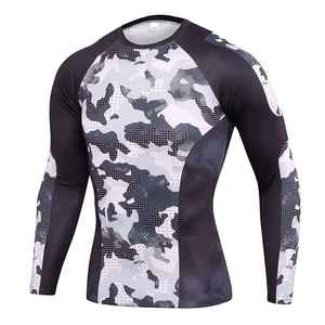 เสื้อรัดกล้ามเนื้อ MMA คุณภาพสูง ขายส่ง พิมพ์ลายตามสั่ง ระบายอากาศได้ดี ผลิตจากโพลีเอสเตอร์และไนลอน สำหรับผู้ใหญ่ ทั้งชายและหญิง เหมาะสำหรับกีฬายิวยิตสู MMA และ BJJ - Product Image 1