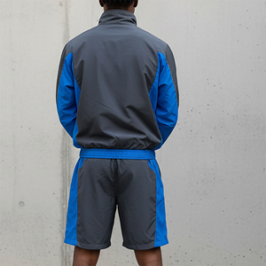 Ensemble de jogging deux pièces en nylon et polyester sur mesure OEM/ODM, avec empiècements color block, coupe-vent, tendance, pour homme - Product Image 6