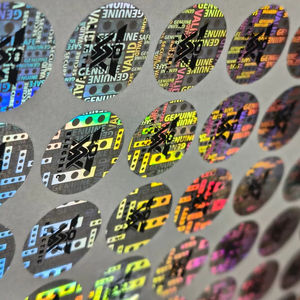 ฉลากป้องกันการปลอมแปลงแบบโฮโลแกรมสีเงิน ตัดได้ตามต้องการ กันน้ำ ป้องกันการงัดแงะ รูปทรงตามสั่ง ฉลากบรรจุภัณฑ์แบบ UV - Product Image 1