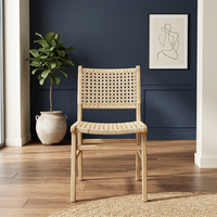 Découvrez l'élégance moderne avec la chaise de salle à manger en rotin Sabang, fabriquée en rotin bien affiné et en bois de teck robuste, 50x60x88 cm