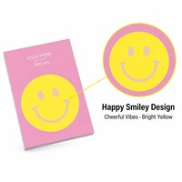 Bloc-notes autocollant avec visage souriant