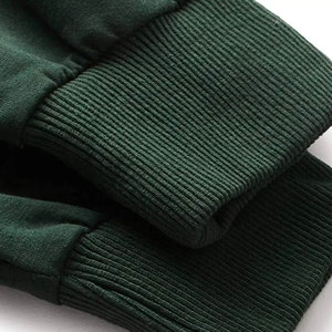 Sweat à capuche polaire brodé haut de gamme pour femme, coupe athlétique, avec fentes latérales, idéal pour l'hiver - Product Image 3